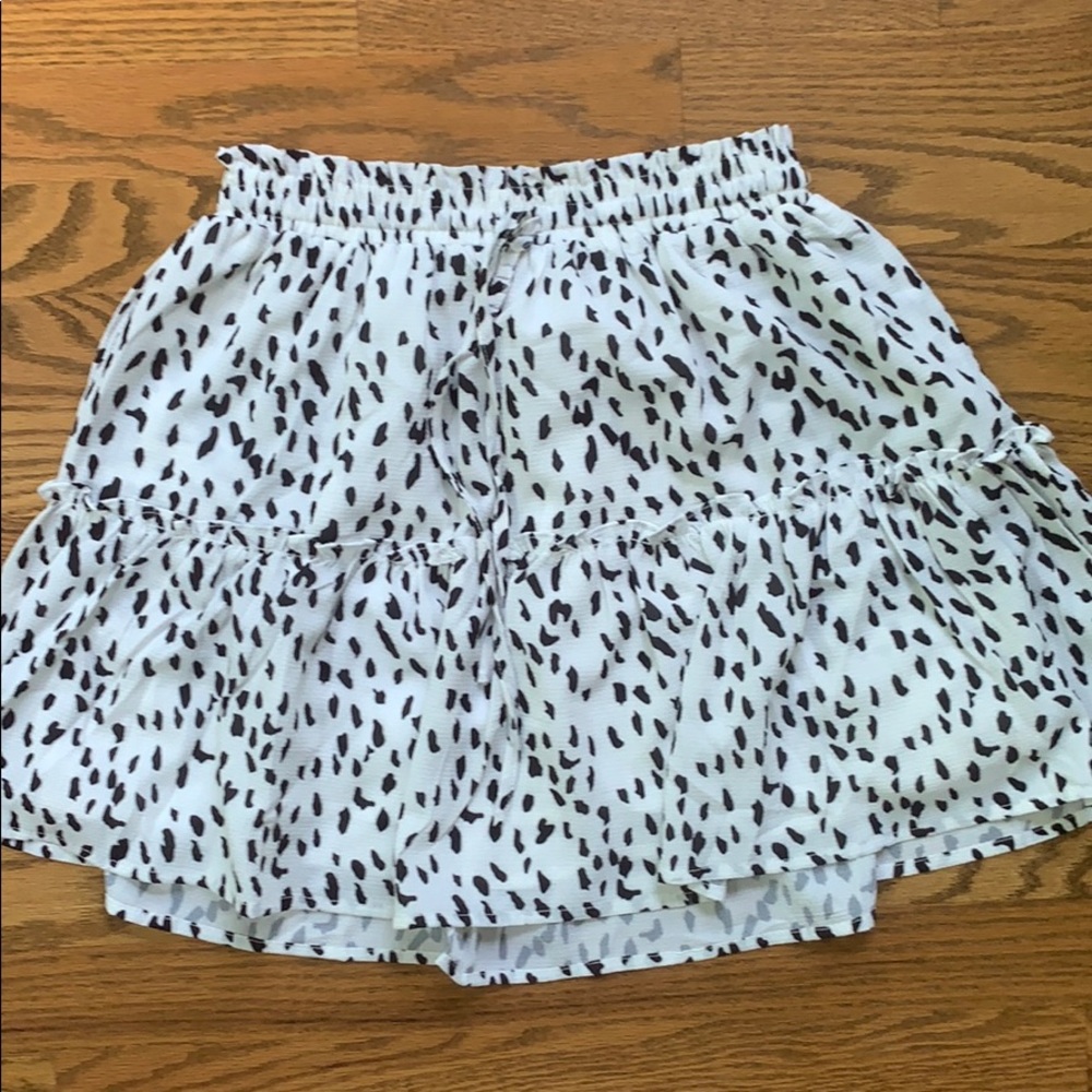Super comfortable, cow print princess poly skirt!